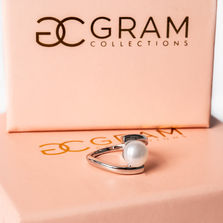 Luella Ring standing on its box, seeing from a profile view. 