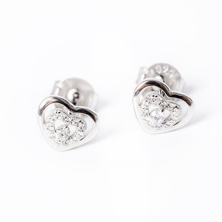 A close up profile view of Madeline earrings standing in the center of the image against a white background. 