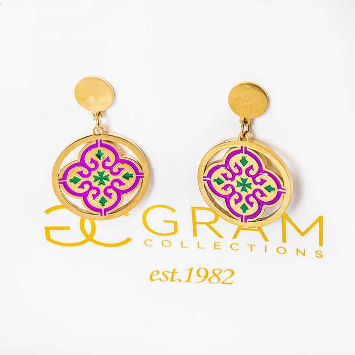 Gold maduma earrings with purple and green design on a white background, featuring 'Gram Collections' logo.