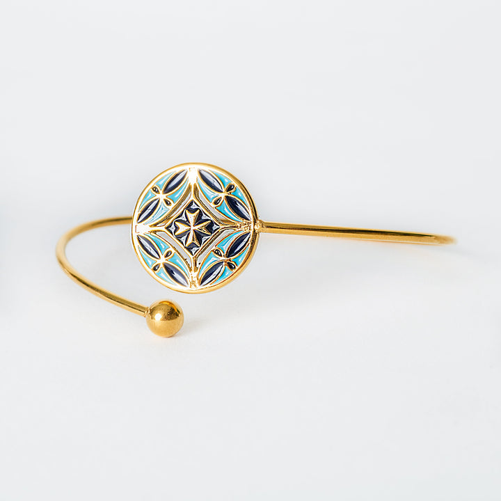 A close up view of Malta Bracelet standing in the center of the image against a white background. 
