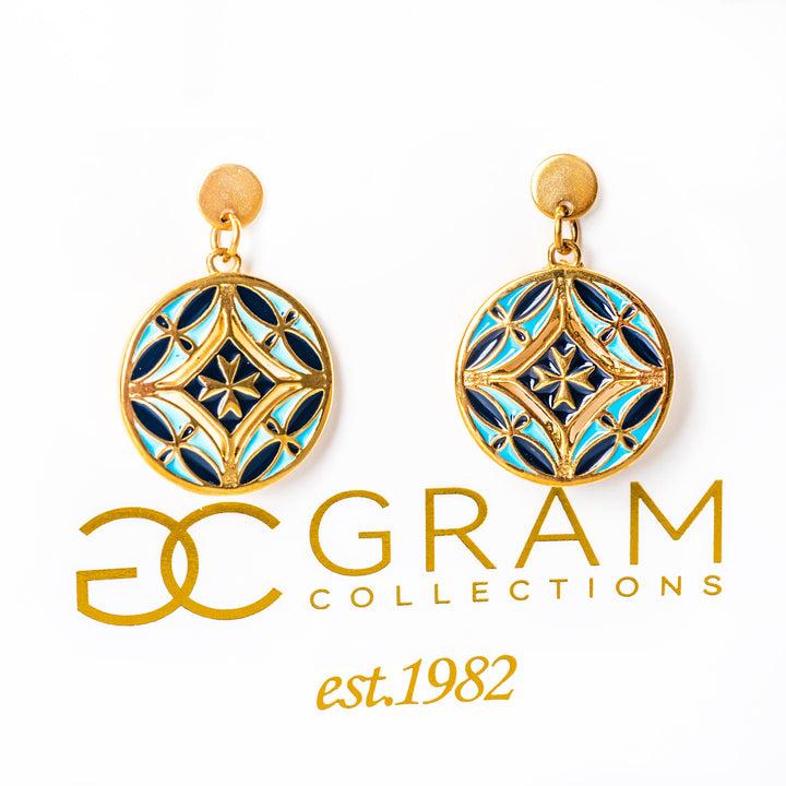 Gold and blue earrings with 'GRAM Collections' logo on a white background