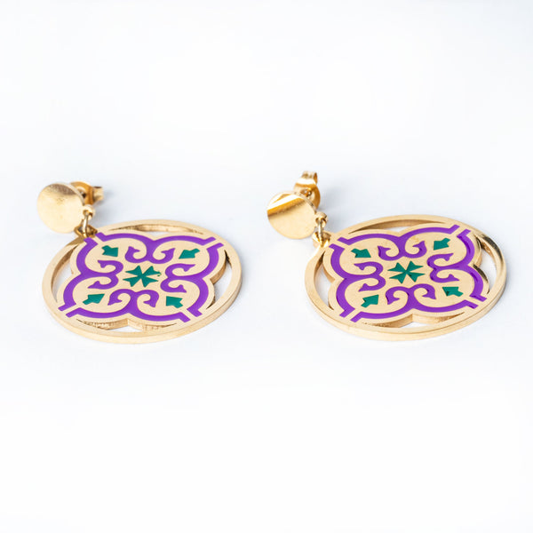 A pair of gold-colored Maltese cross earrings with purple and green enamel details, designed in a circular pattern with a Maltese cross motif.