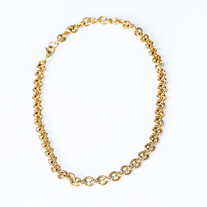 A bird view of Marta Necklace standing in the center of the image against a white background. 