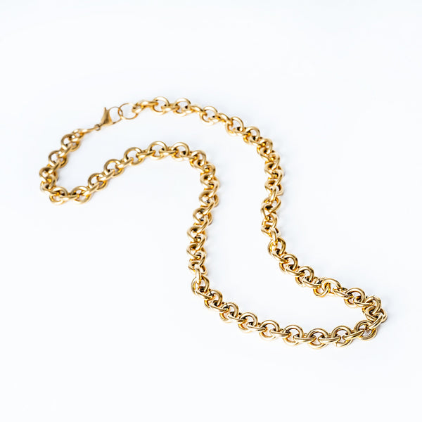 A gold-plated stainless steel Marta necklace with a chain design, displayed against a white background.