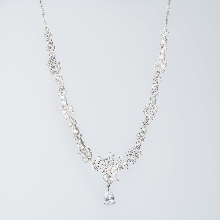 Melissa necklace close up look against a silver background 