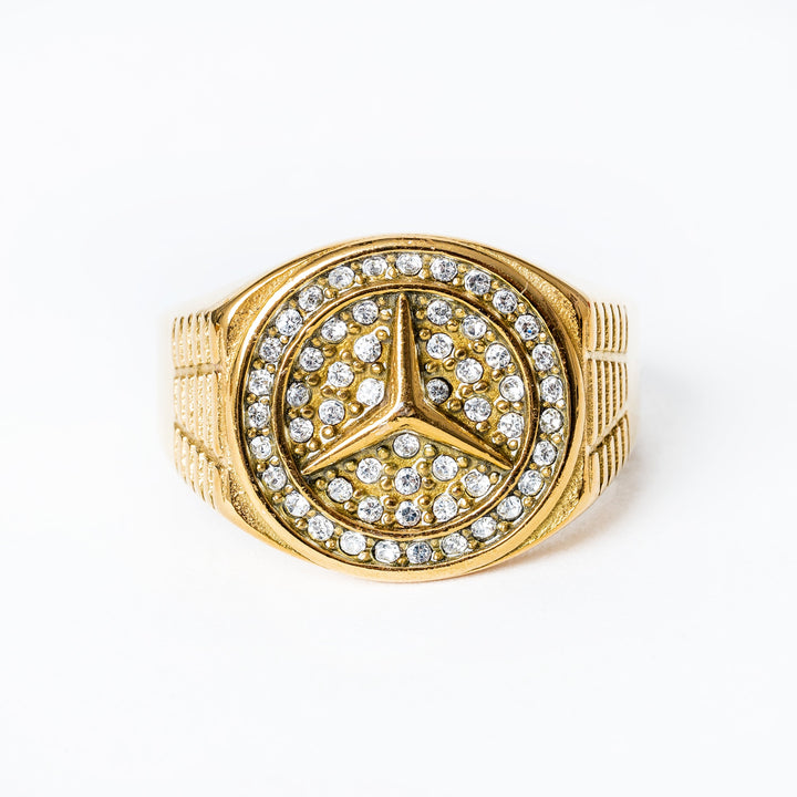 A profile view of Mercedes Ring standing in the center of the image against a white background. 