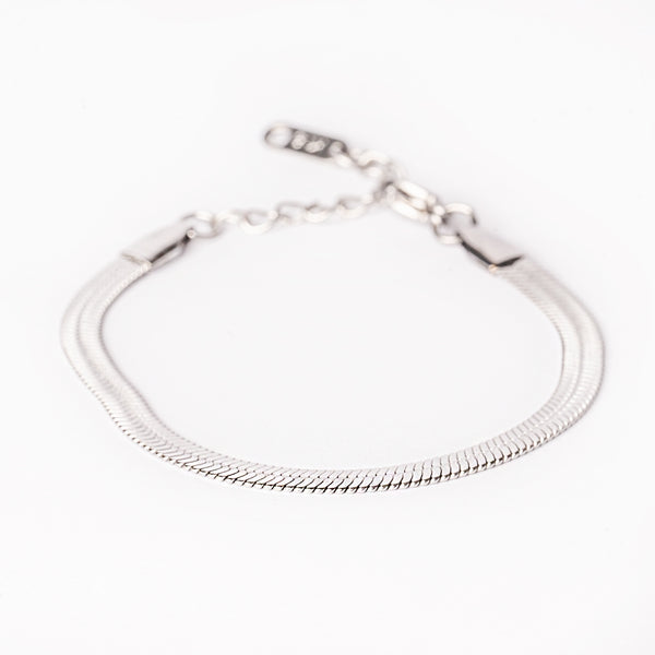 A silver Messina stainless steel bracelet with a double chain design on a white background.