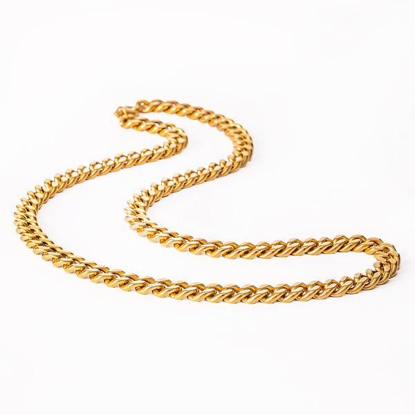 A close up view of Milan Necklace standing in the center of the image against a white background. 