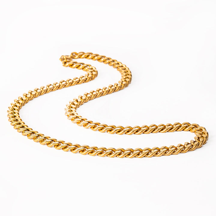 A close up view of Milan Necklace standing in the center of the image against a white background. 