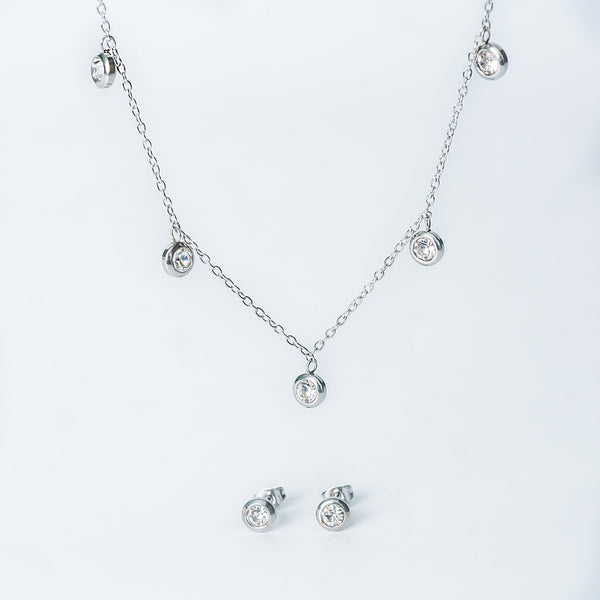 Silver Mirielle jewelry set with a dangling crystal necklace and matching crystal stud earrings
