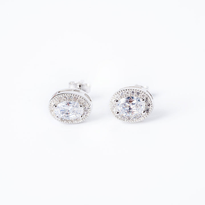Natalia earrings placed in the center of the image against a white background 