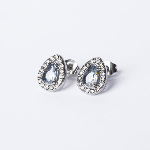 A close up view of Natalie Silver Earrings standing in the center of the image against a white background. 