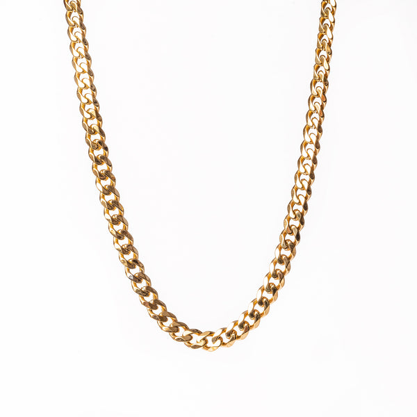 A gold-colored stainless steel Padova necklace with a uniform pattern displayed against a white background.
