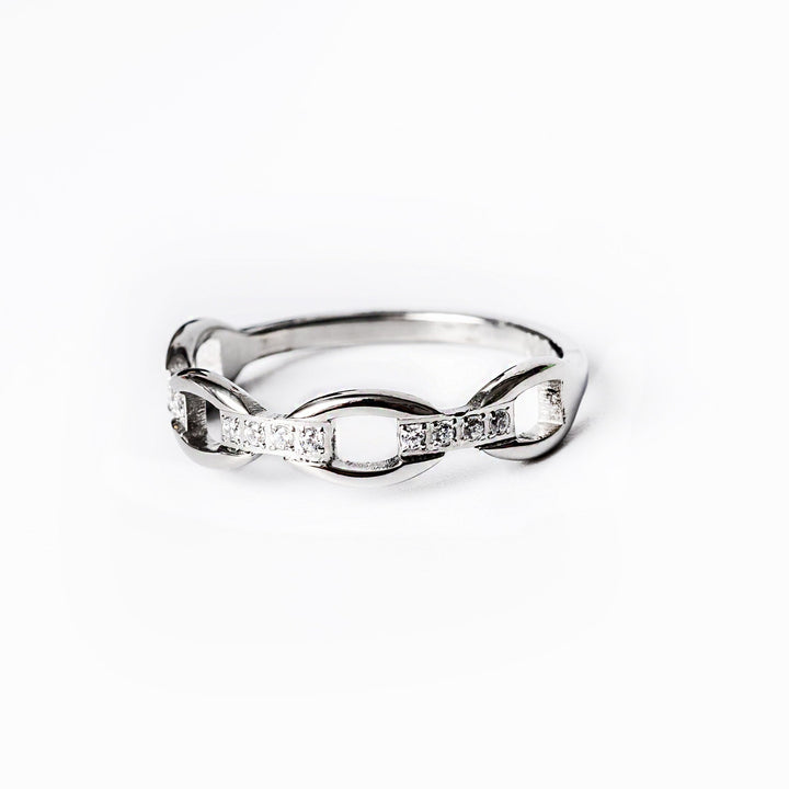 A close up view of Pamela Silver Ring standing in the center of the image against a white background. 