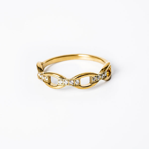 A close up view of Pamela Gold Ring standing in the center of the image against a white background. 