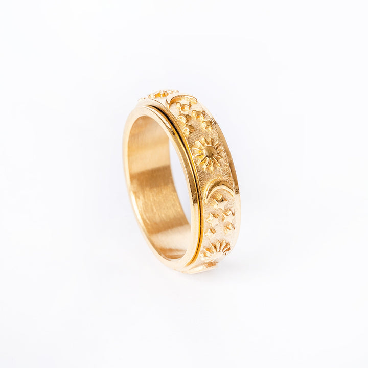 A profile view of panrea ring standing in the center of the image against a white background. 