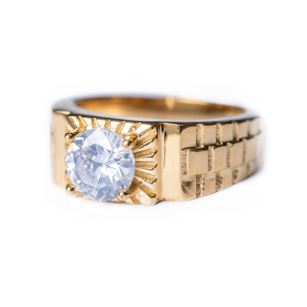 Gold Peter Ring with a large clear round stone set on a textured band