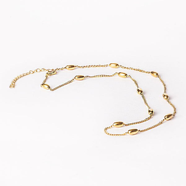 A yellow gold stainless steel necklace with a length of 50cm, featuring a design of circular charms or beads.