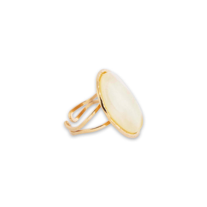 Pretty Bay ring with a large yellow stone on a white background