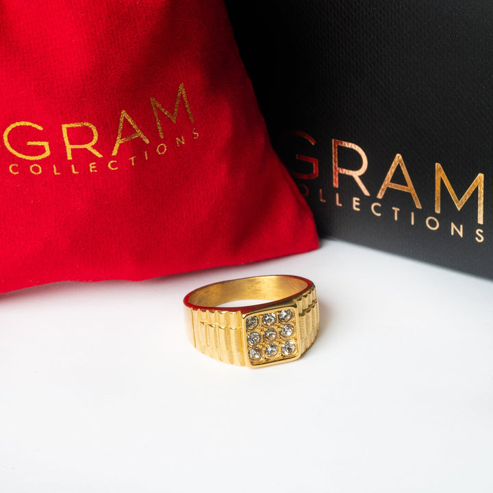 Rolex His & Hers Ring standing in front of its black box and red package. c