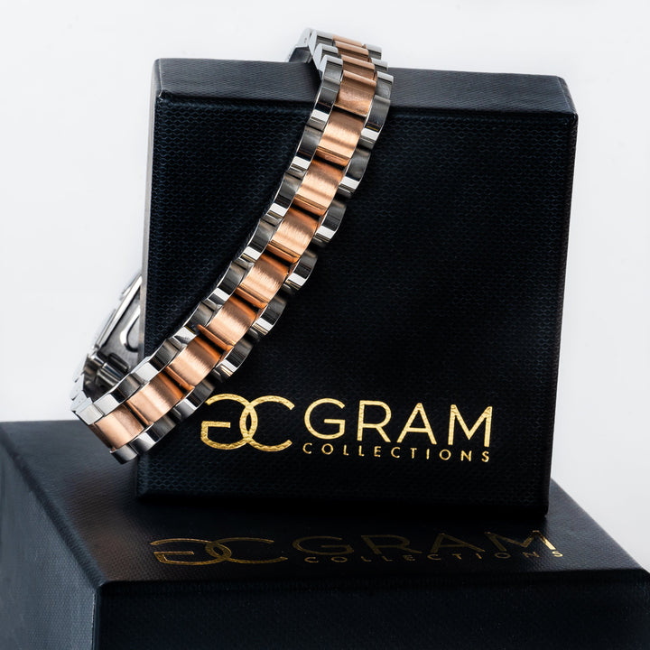 A close up view of Rolex Style Bracelet Rose Mix placed on its box. 