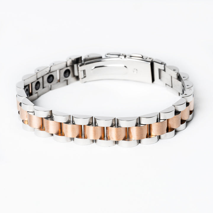 A stainless steel Rolex Style  bracelet with rose gold and silver color elements, featuring a mix of metallic links and a rose gold-colored band.