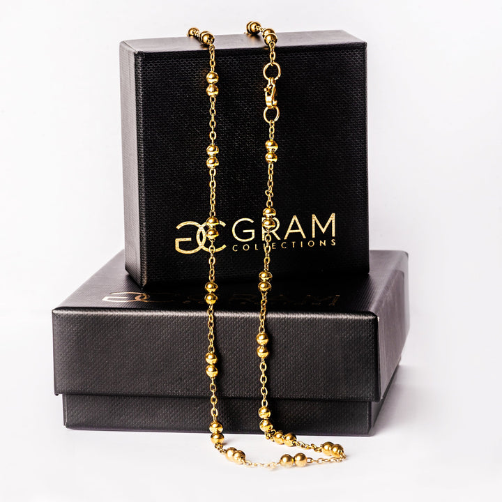 Roma necklace standing in the center of the image against a white background 