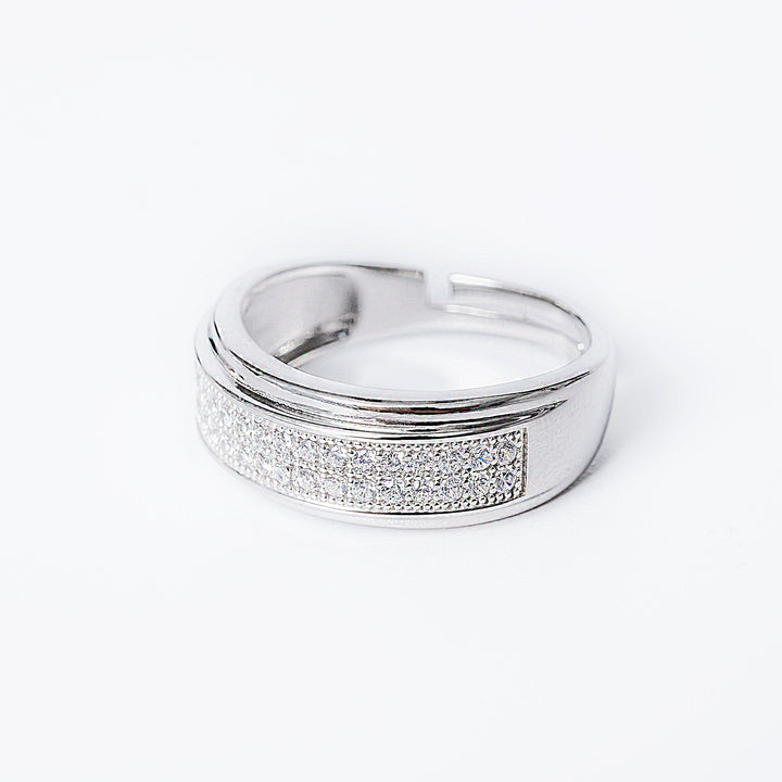 A close up view of Rosalinda ring standing up against a white background. 