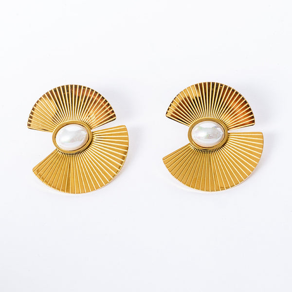 A pair of gold-colored, fan-shaped Runy earrings with a white pearl at the center, displayed against a white background.