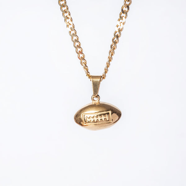 a close up view of Rugby Necklace standing in the center of the image against a white background. 