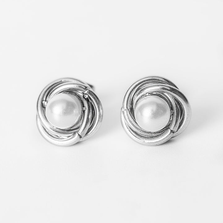 Ruth silver stud earrings with wrapped pearl design