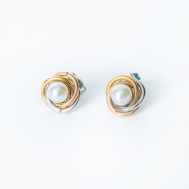 Ruth tricolor stud earrings with wrapped pearl design