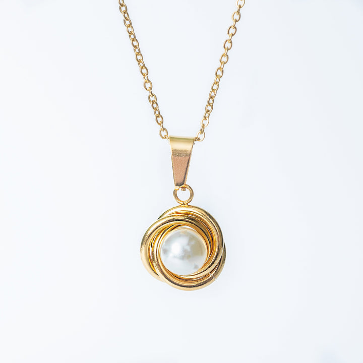 Ruth gold necklace with wrapped pearl pendant