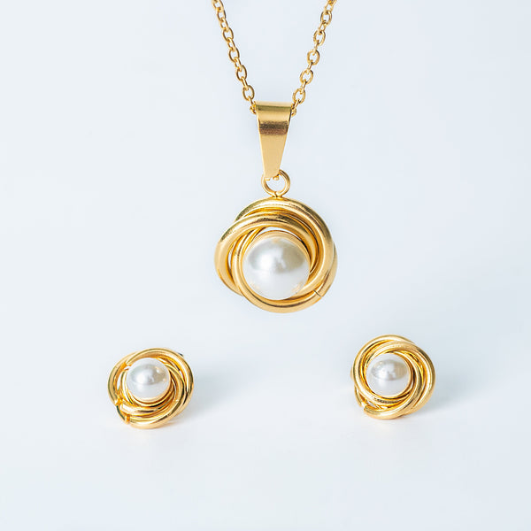 Ruth gold jewelry set with pearl pendant and matching pearl earrings
