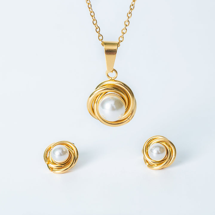 Ruth gold jewelry set with pearl pendant and matching pearl earrings