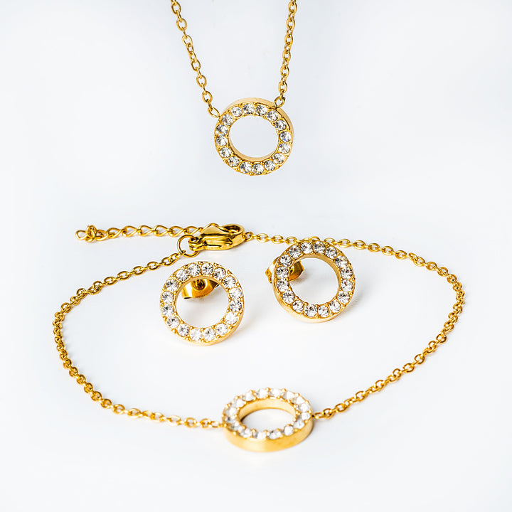 A close up view of sami jewelry set standing in the center of the image against a white background. 