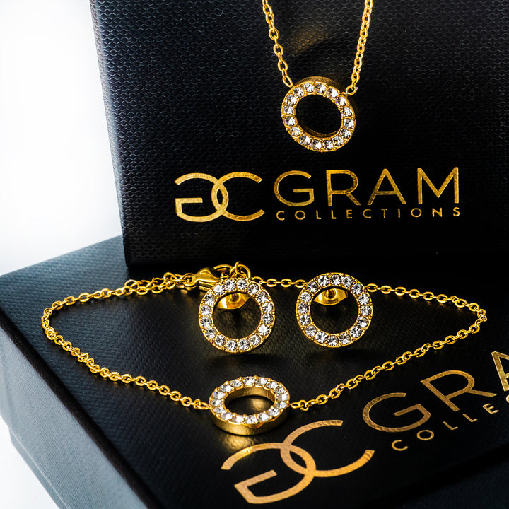 Samo necklace placed in the center of its uniquely designed box, surrounded by a white background. 