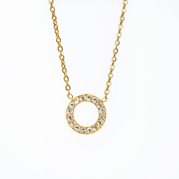 A sami necklace standing in the center of the image against a white background. 