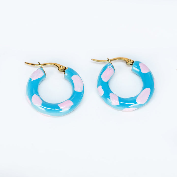 A bird view of Sea Earrings standing in the center of the image against a white background. 