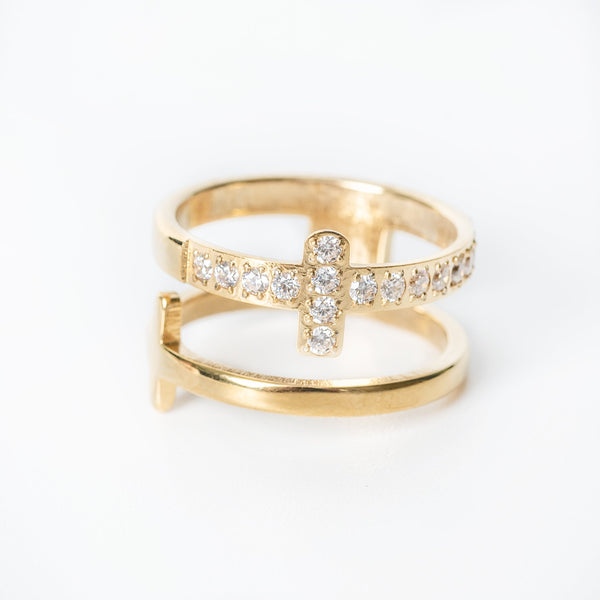Sefora gold ring with crystal cross design