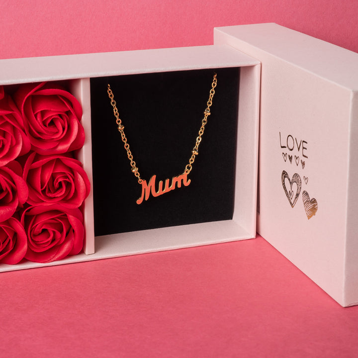 A close up view of Rosina mum necklace standing in the center of the image. 