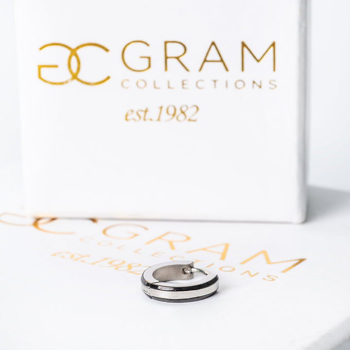 Simon Earrings standing on its beautifully designed gram collections box. 