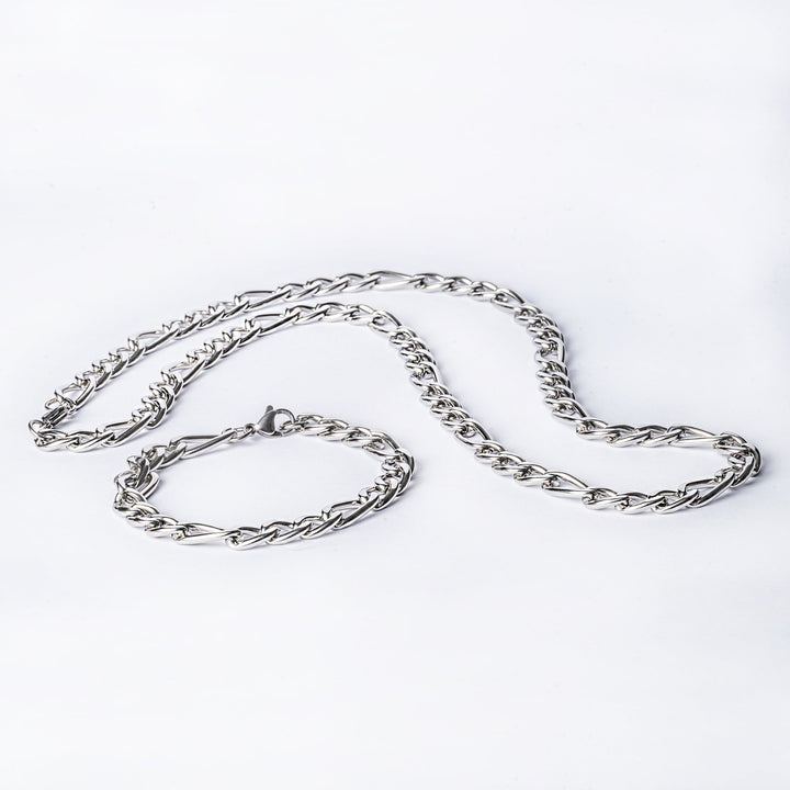 A silver stainless steel bracelet displayed on a white background.