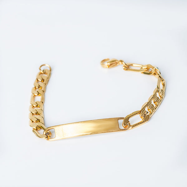 Gold Stefan Bracelet with an ID plate shown in an angled view
