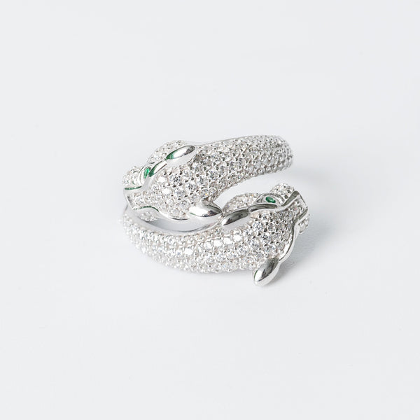 Sophie ring with a hypoallergenic rhodium finish, featuring a series of round cubic zirconia embellishments set within a linked band design.