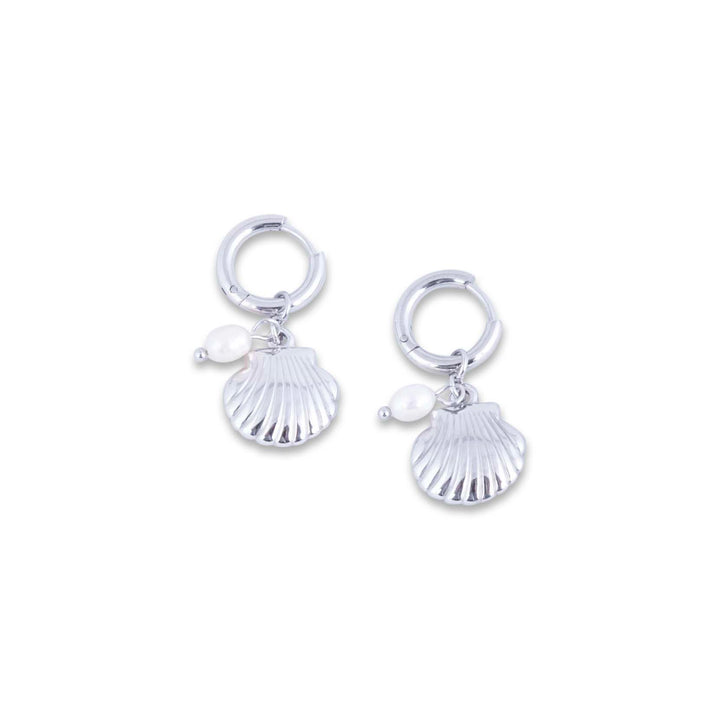 Arzella Earrings with shell and pearl charms on a white background