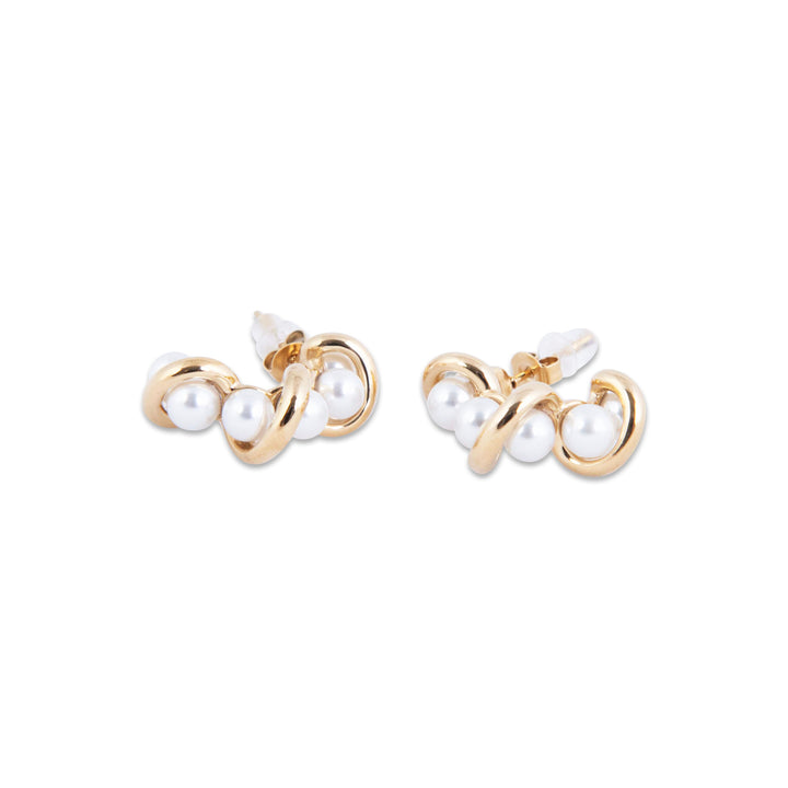 Pair of Riviera Earrings with pearls on a white background