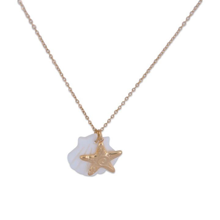 Necklace with a gold starfish pendant on a white background, close view 