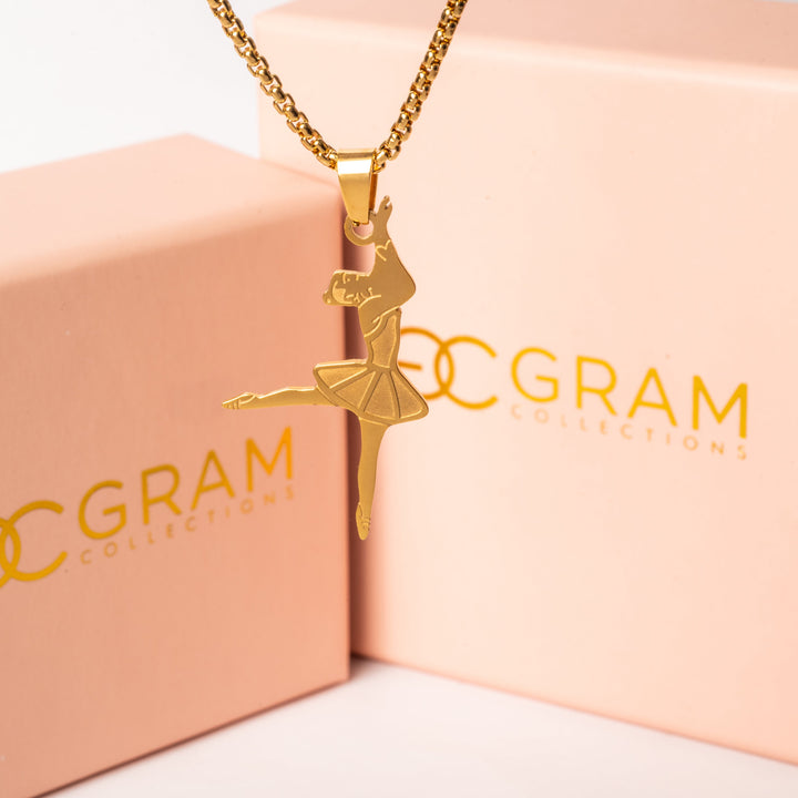 The Ballerina Necklace surrounded by its unuquely designed pin boxes. 