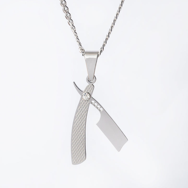 The close up view of barber necklace standing in the center of the image against a white background. 